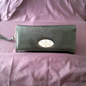 Small black leather envelope wristlet